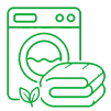 Line drawing of a washing machine with folded towels and a small leaf in front, suggesting eco-friendly laundry.